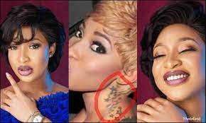 Pokolee of the lee temple seems to be enjoy her new name and fame in d'banj's db records, the actress has finally joined the likes of rihanna to get the famous traditional tattoos on her arm. Tonto Dikeh Finally Explains The Reason Behind Her Neck Tattoos Screenshot Ghbase Com