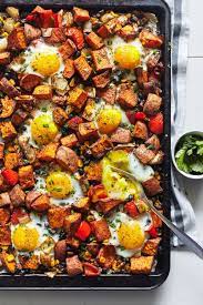 Sheet Pan Sweet Potato Hash With Eggs Recipe The Beachbody Blog Recipe Sweet Potato Hash Recipe Healthy Breakfast Recipes Sweet Potato Hash