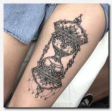 50 Amazing Hourglass Tattoos And Meanings Hot Tattoo Leg Tattoos Neck Tattoo Hourglass Tattoo