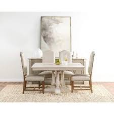 The dining room table is that one piece of furniture around which your entire family will gather on the most special occasions. Our Best Dining Room Bar Furniture Deals Dining Table Square Dining Tables Kosas Home