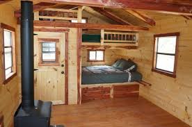 Amish Ish Cabins Very Creative Use Of A Small Cabin Space To Allow Somewhat Large Bunk Beds And Small Cabin Interiors Tiny Cabins Interiors Small Cabin Plans