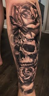Ruby rose has got a pattern of cherry blossom, waves, and tiger inked on the inner portion of her right arm. 50 Skull Rose Tattoos Meanings Tattoo Designs More
