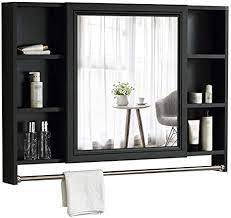 This makes for an intriguing yet stylish space. Amazon Com Laxf Mirrors Bathroom Cabinet With Towel Rod Mirror Cabinet Wall Cabinet Single Door Cabinet Bathroom Hanging Cabinet Medicine Cabinet Wall Mount Storage Shelf Black Home Kitchen