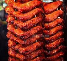 Grilled Chicken Wings Are A Popular Snack Found All Over Sabah This One Was Taken At Pasar Kim Fung Batu Popular Snacks Grilled Chicken Wings Grilled Chicken