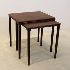 Everything is solid white oak except for the drawer fronts, which are walnut. Set Of Dark Oak Nesting Tables By E W Bach For Mobelfabrikken Toften Denmark 1960s 96554