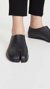 Jimmy choo shoes saint laurent shoes valentino shoes gucci shoes dolce & gabbana shoes gianvito rossi shoes tod's shoes giuseppe zanotti shoes nike shoes hogan shoes. Maison Margiela Tabi Flat Utilitarian Mules Shopbop New To Sale Up To 70 Off New Styles To Sale In 2020 Rubber Heels Maison Margiela Tabi Shoes