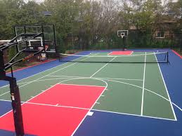 Many of us grew up shooting hoops in the driveway, chasing the basketball as it bounced into this is a great alternative when your backyard has limited access, impervious cover restrictions or when you want to be able to remove the court later. Backyard Basketball Court Installation In Chicago Il
