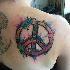 The feather connected to the peace symbol represents. 55 Best Peace Sign Tattoo Designs Anti War Movement Symbol 2019