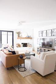 Modern White Farmhouse With Black Windows And Doors Leather Sofa Living Room Farm House Living Room Leather Couches Living Room