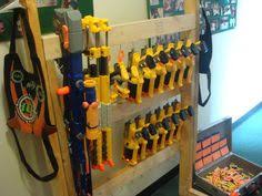 So we decided we're going to show you how to make it and where to get the parts and pieces so you can make your own very cool tactical gun wall that screams nerf. Nerf Storage