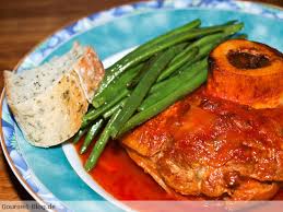 Ein idealer begleiter zu fleischgerichten! Kalbshaxe Mit Keniabohnen In Wurziger Tomatensauce