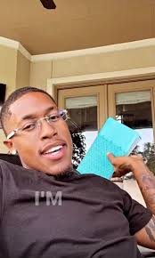 Corey Pritchett Reading Her Book