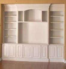 Love This Built In But I M Sure It Would Cost A Fortune Anyone Know Where I Can Find One Similar But Bookshelves Built In Built In Entertainment Center Home