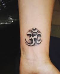 Although this design is done in black and white, it still looks pretty. Wrist Shiva Tattoo Small Elegant Arts Tattoo