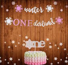 Baby shower accessories for this style of party often include games where guests can vote on which gender they think the baby will be. Set Of 2 Glitter Pink Winter Onederland Banner Winter Onederland Cake Topper Winter Baby Shower Decoration Winter Party Decoration Party Supplies Toys Games