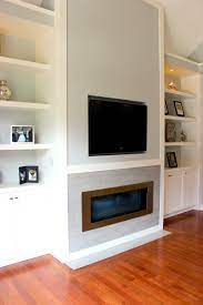 10 best small tvs to buy in 2020. White Living Room Wall Unit With Built In Television And Gas Fireplace Insert Combination Of Open Shelvi Family Room Design Family Room Living Room Wall Units