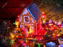 The candy on your gingerbread house will play an important role in creating a vibrant holiday theme. Gingerbread Houses In Christmas Christmas Garland Close Up Xmas Stock Photo Picture And Royalty Free Image Image 90798481