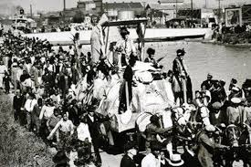 Here, two visitors prepare for the parade, at a 3am breakfast at the hilton. History Of Zulu In New Orleans