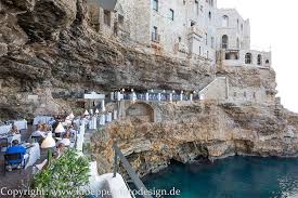 Finding our way through polignano a mare to the famous restaurant in a seaside grotto. Grotta Palazzese Hotel And Ristorante In Polignano A Mare Puglia