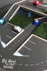 Diy Toy Car Road Table Big House In The Woods In 2020 Diy Toys Car Play Mat Diy Diy Toys