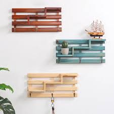 Concentrated freelancer using laptop, sitting on couch at home, earning online concept. Vintage Contracted Wood Wall Shelf Decoration Creative Household Storage Hook Rack Wall Decor Home Decoration Accessories Decorative Shelves Aliexpress