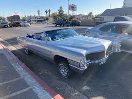 Image result for Starlight Silver 1965 Cadillac