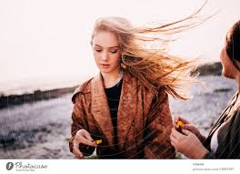 Dyeing your dark hair icy blond is just about the most damaging thing you can do. Portrait Of Young Women With Long Blonde Hair Blowing In Wind A Royalty Free Stock Photo From Photocase