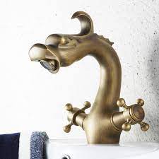 This dragon faucet design is inspired by a dragon, which is sure to add a touch of class and luxury to your bathroom. China Antique Wash Basin Faucet Animal Dragon Bathroom Basin Tap Single Hole China Sanitary Ware Deck Mounted Faucet