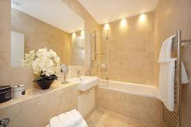 A beige and creamy bathroom with bubble lamps and a modern glass clad shower space (period extensions & designs). Bathroom Ideas In Beige Beige Bathroom Beige Marble Bathroom Bathroom Interior