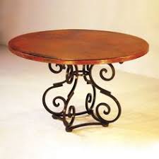 Pair of midcentury tables with hand hammered copper round tops having acquired a time worn patina over three elegant legs featuring turned brass ornaments and. 8 Copper Tables Ideas Copper Top Table Copper Table Dining Table Copper
