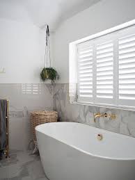 A window shutter is a solid and stable window covering usually consisting of a frame of vertical stiles and horizontal rails (top, centre and bottom). Diy Window Shutters Lust Living