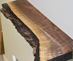 Its cool, raw edge vibe looks great in almost any setting and it is sure to be a conversation starter. Walnut Live Edge Floating Shelf With Bark