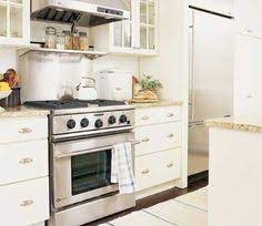 Looking for interior designers and decorators near me? Bristol Door Style In Maple Finished In Ivory Cream Cabinetry White Kitchen Doors