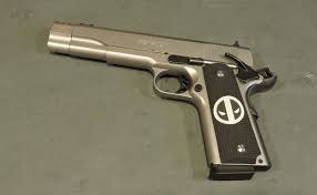 A generous relief is formed in the left grip so you can manipulate the magazine. Deadpool Custom 1911 Grips 1911 Grips Custom 1911 Grips Laser Engraving