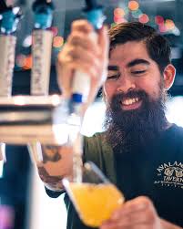 Our kitchen is back! Enjoy a FREE pint of our Pilsner or Octoberfest  tonight only with a burger or chicken sandwich order. Featured here is our  La Frieda Short Rib Blend Burger