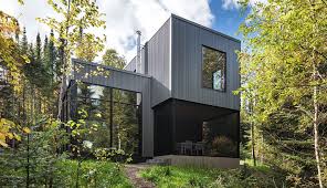 These oversized windows draw the outdoors in and flood have a look at some of the best—and find out what you can expect for an average floor to ceiling. Modern Cabin With Floor To Ceiling Windows Floats In The Trees Quality Window Door Inc