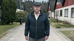 59 year old ove is the block's grumpy man who several years earlier was deposed as president of the condominium association, but he could not give a damn about being deposed and therefore keeps looking over the neighborhood with an iron fist. A Grouch Gradually Grows Grudgingly Grateful In A Man Called Ove Npr