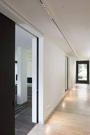Hallway With White And Black Nuit Profile Surface Mounted Together With White Wall Mounted Trimless Hallway Lighting Led Recessed Lighting Light Architecture