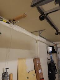 I have a 4:12 roof in my garage, and not much room between the top of the garage opener and the ridge beam. Roof Top Tent Hoists For Garage Storage Toyota Tundra Forum