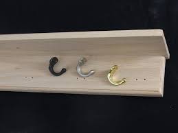 I find it easier to apply the finishes prior to installing the pegs. Unfinished Shaker Peg Racks Coat Racks And Picture Ledges Made In The Usa