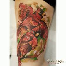 Abstract cardinal tattoo on forearm. Mother S Ruin
