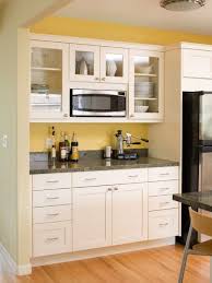 10 Small Kitchens And Storage Tricks That Inspired Us This Year Built In Microwave Cabinet Kitchen Cabinet Styles Contemporary Kitchen