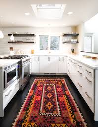 A bright white ceiling and trim keep things feeling light and airy. Modern Living Room Rug Ideas