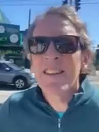 Wild moment Monique Ryan's husband is confronted after tearing down poster  of his wife's political rival