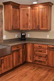 Repainting kitchen cabinets may sound daunting, but with these color combinations, you can't fail. Haas Door Style Shakertown Rustic Hickory Pecan Kitchen Design Kitchen Cabinet Design Kitchen Remodel