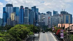 This photo taken on january 29, 2019 shows a general view of the skyline of the financial district of makati in manila. Trade Department To Give Incentives To Companies Opening Outside Of Metro Manila Coconuts Manila