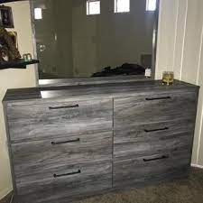 If your priority is storage, be sure to look at master bedroom sets that include bed storage with drawers. Baystorm 6 Drawer Dresser Ashley Furniture Homestore