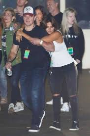Matt Damon And Wife Luciana Barroso Share Sweet Pda At Coldplay Concert Pics Entertainment Tonight Luciana barroso set the red carpet ablaze wearing a bright red strapless gown with metallic details. matt damon and wife luciana barroso
