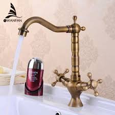 The kitchen faucet is one of those items we've all taken for granted. Kitchen Faucet Antique Bronze Brass Kitchen Sink Faucet Double Handle 360 Rotation Tall Spout Cold Hot Water Mixer Tap Hj 6713f Mixer Tap Brass Kitchenkitchen Faucet Aliexpress