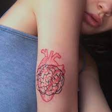 Red Heart And Black Brains Tattoo On The Right Upper Arm Brain Tattoo Tattoos Red Tattoos